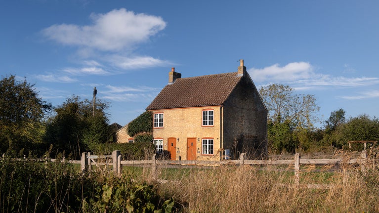 The exterior of semi-detatched holiday cottages on the edge of Wicken Fen. Cladium is on the left and Wicken Rose Cottage is on the right, Cambridgeshire